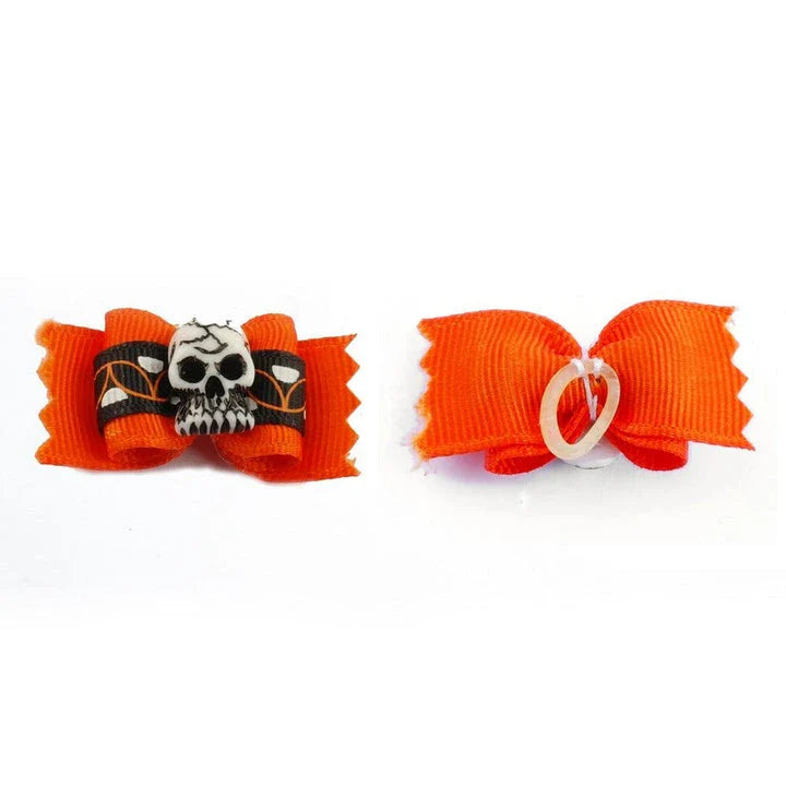 Colorful pet Halloween hair bows in a variety of spooky designs