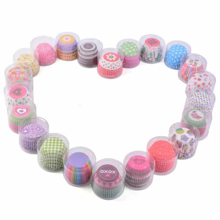 100 pack of eco-friendly, greaseproof cupcake liners in various pastel colors