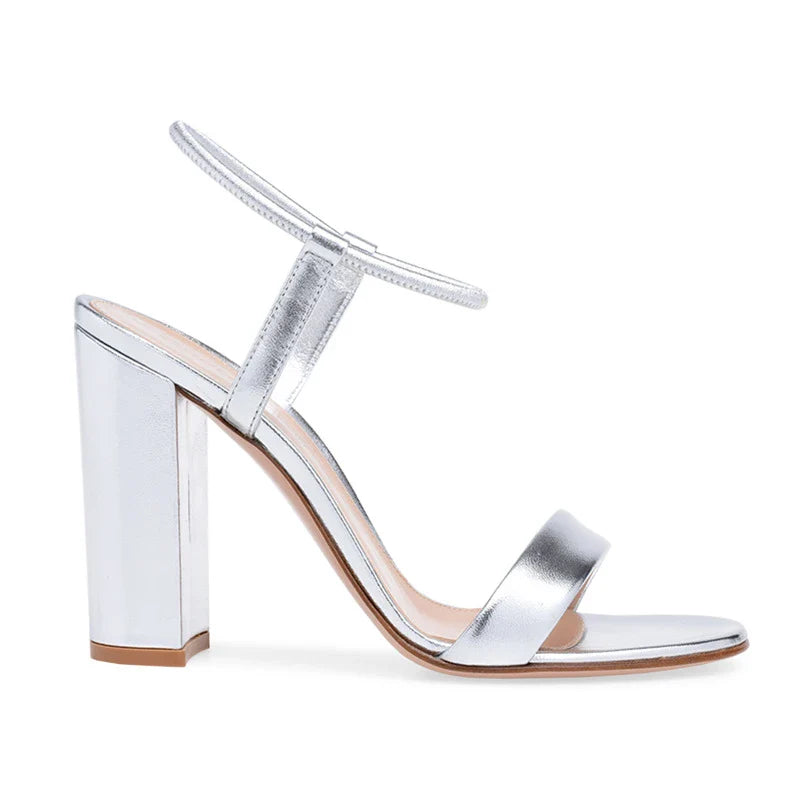Elegant high heel banquet sandals with thick platform sole, round toe, and gold or silver finish