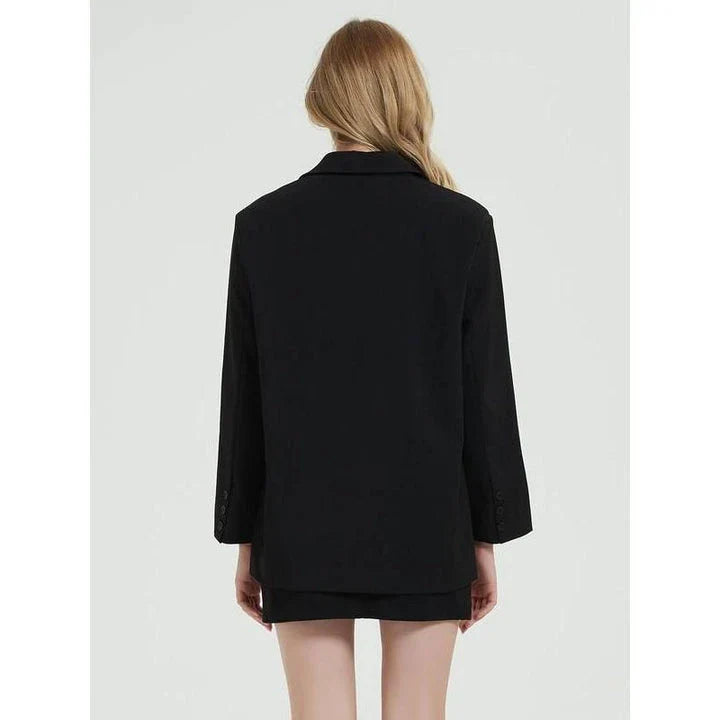 Elegant women's black blazer coat with a turn-down collar, single-breasted closure, and practical pockets for a polished, professional look.