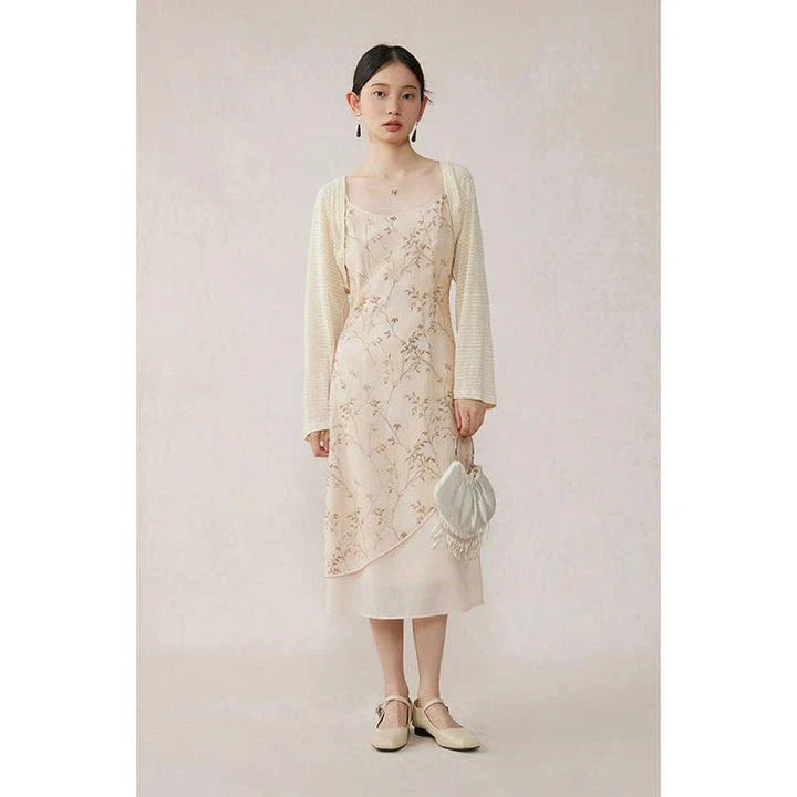 Elegant floral A-line midi dress with spaghetti straps and lace accents