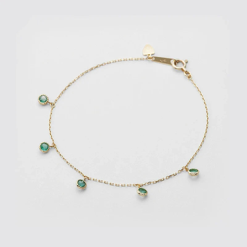 Luxury 925 sterling silver bracelet with elegant green olive stones and geometric patterns, inspired by Japanese design.