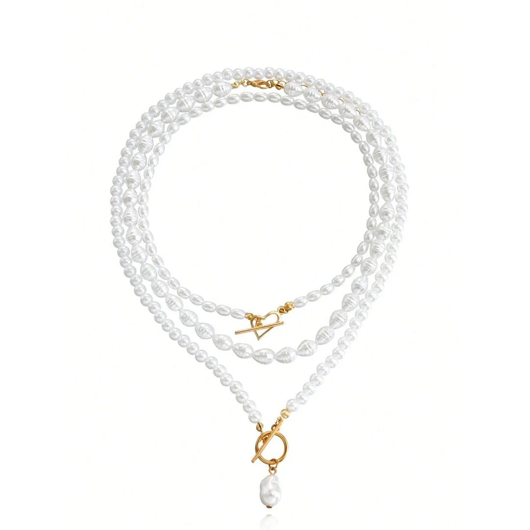 Elegant imitation pearl heart pendant necklace with lustrous bead chain and secure closure