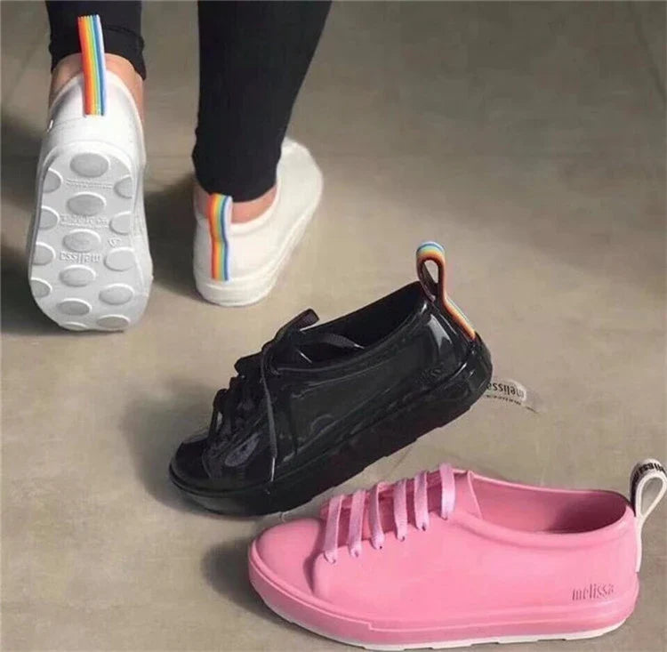 Premium lace-up sneakers for women with stylish flat design in black color