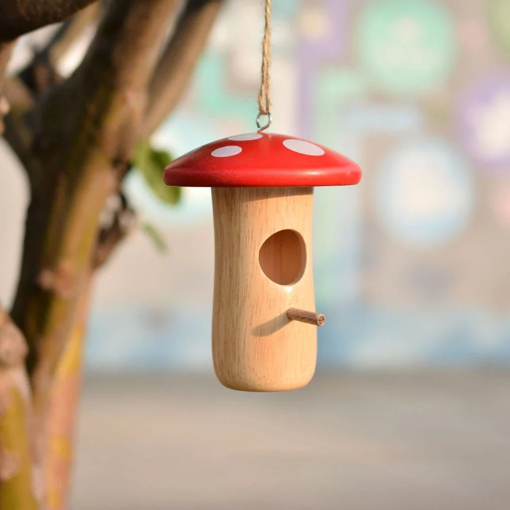 A decorative wooden hummingbird nest with a classic rustic design, perfect for attracting and providing a cozy retreat for hummingbirds in your outdoor garden.