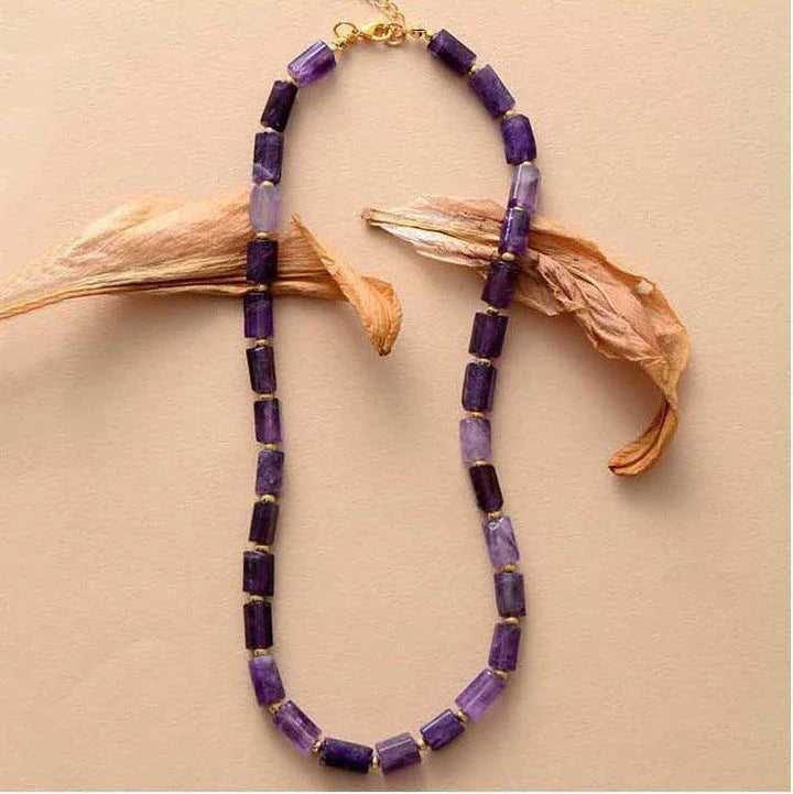 Elegant red natural stone necklace with an adjustable stainless steel chain, perfect for adding a touch of natural beauty to any outfit.