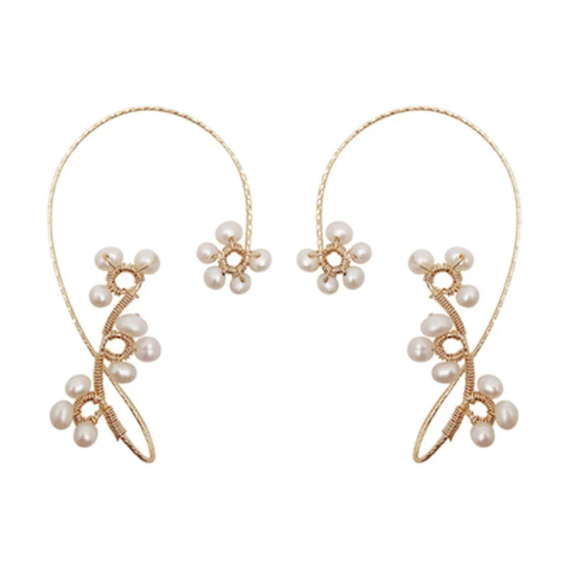 Elegant hand-woven freshwater pearl earrings with a unique geometric design, perfect for adding a touch of sophistication to any outfit.
