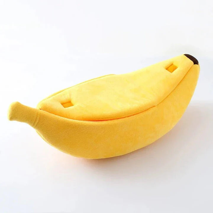 Cozy banana-shaped pet bed in various sizes and colors, providing plush comfort and support for cats and dogs