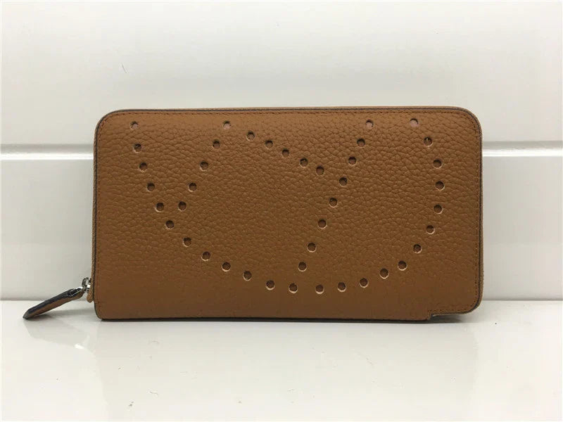 Premium cowhide leather clutch bag with lychee pattern design, featuring a medium-sized square shape and versatile style