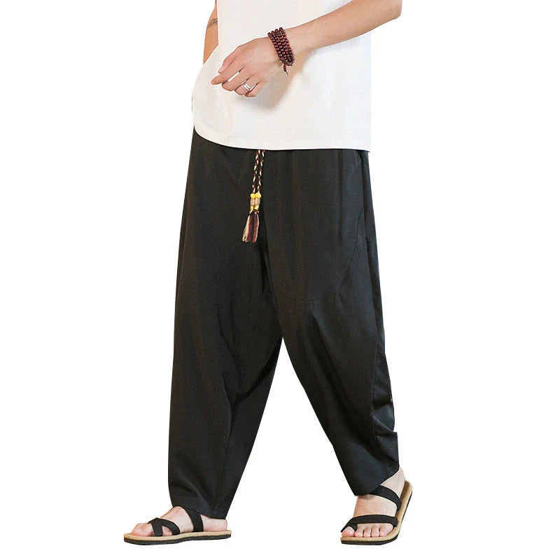 Men's Chinese-inspired harem pants made of luxurious ice silk fabric with a relaxed, draped silhouette