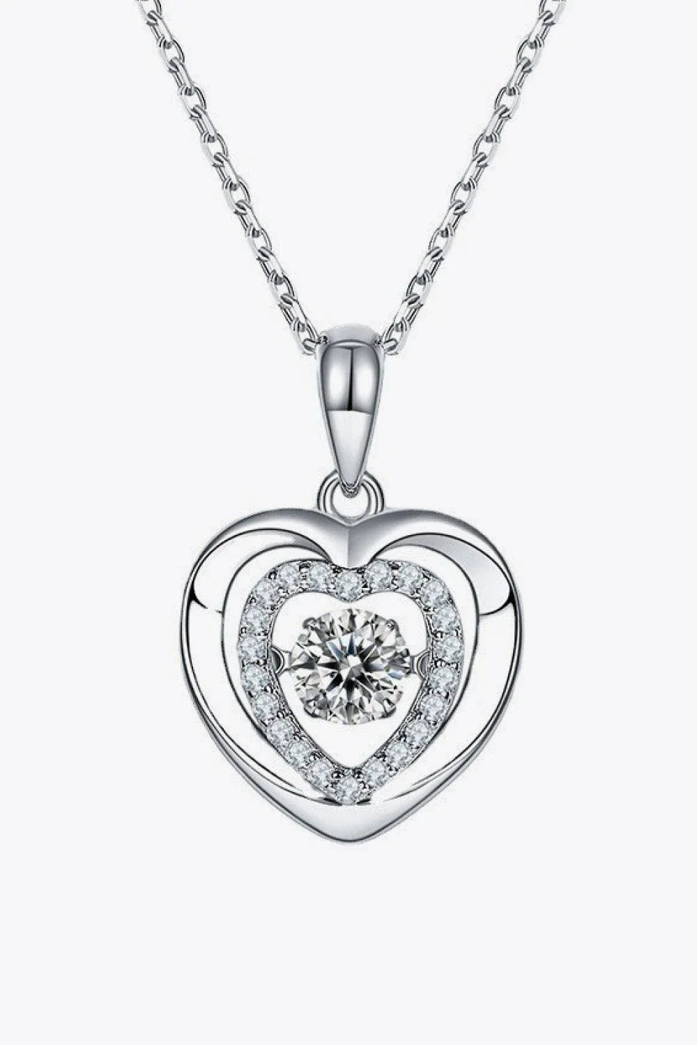 Captivating moissanite heart pendant necklace in sterling silver with a 0.5-carat center stone and sparkling accent stones