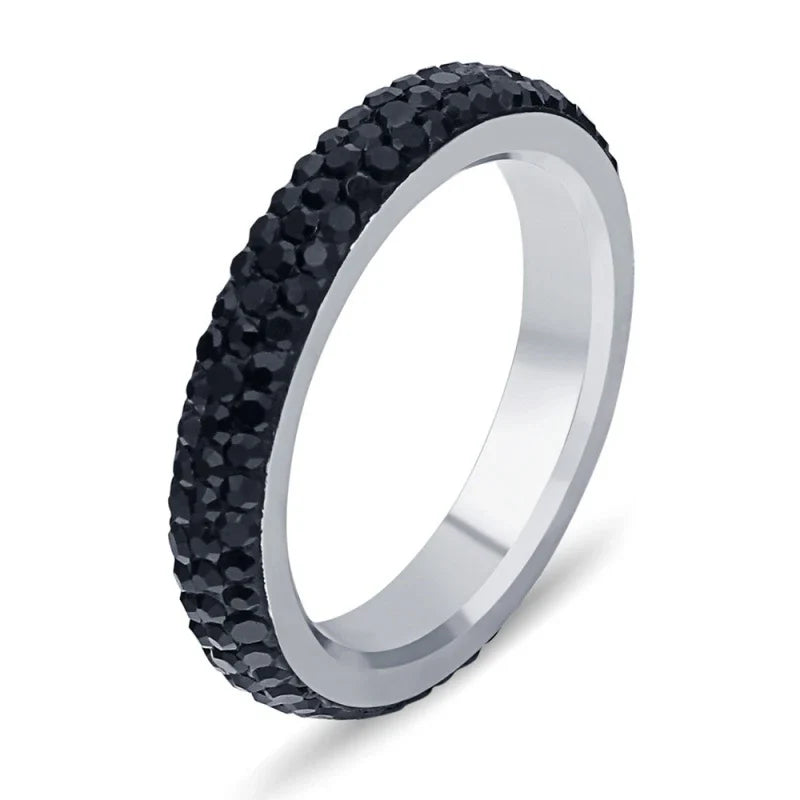 A personalized couple's ring made of stainless steel and adorned with sparkling rhinestones, symbolizing the beauty of your love story.