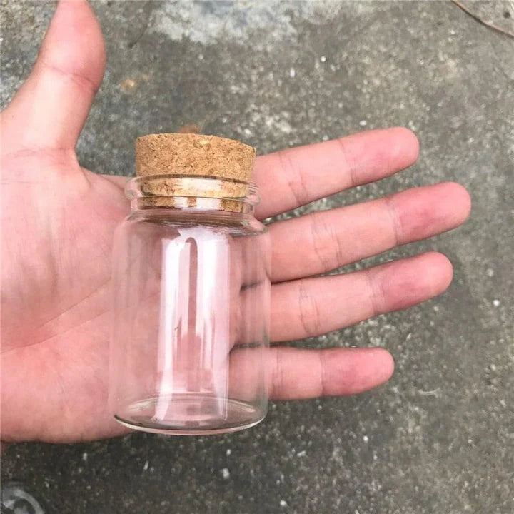 Premium glass spice jar with cork lid for organizing and storing spices, herbs, and seasonings in a modern, minimalist kitchen