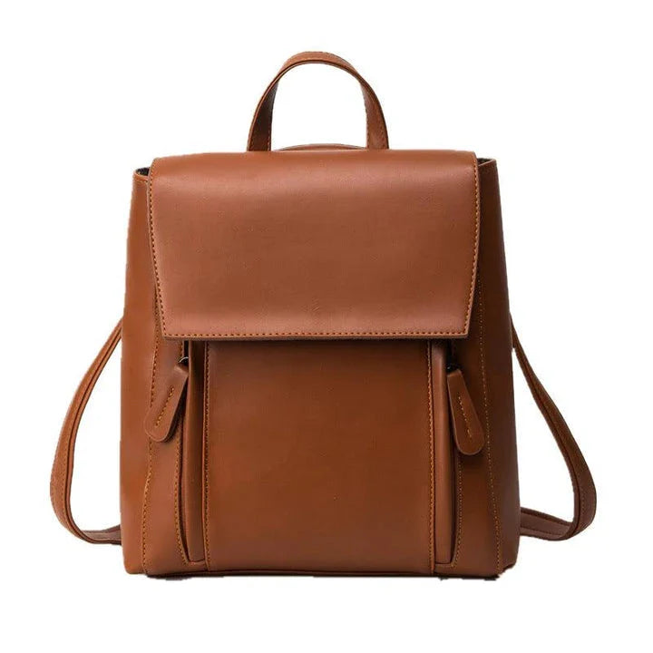 Versatile British-inspired shoulder bag made from high-quality PU leather with a spacious main compartment, convenient pockets, and an adjustable strap