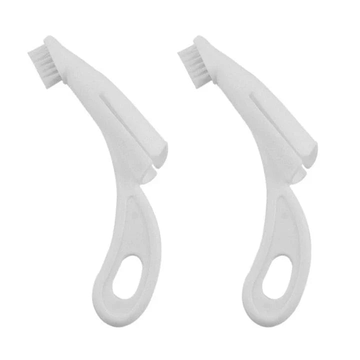 An ergonomic finger toothbrush designed for easy and effective pet dental care, featuring soft bristles and a comfortable grip.