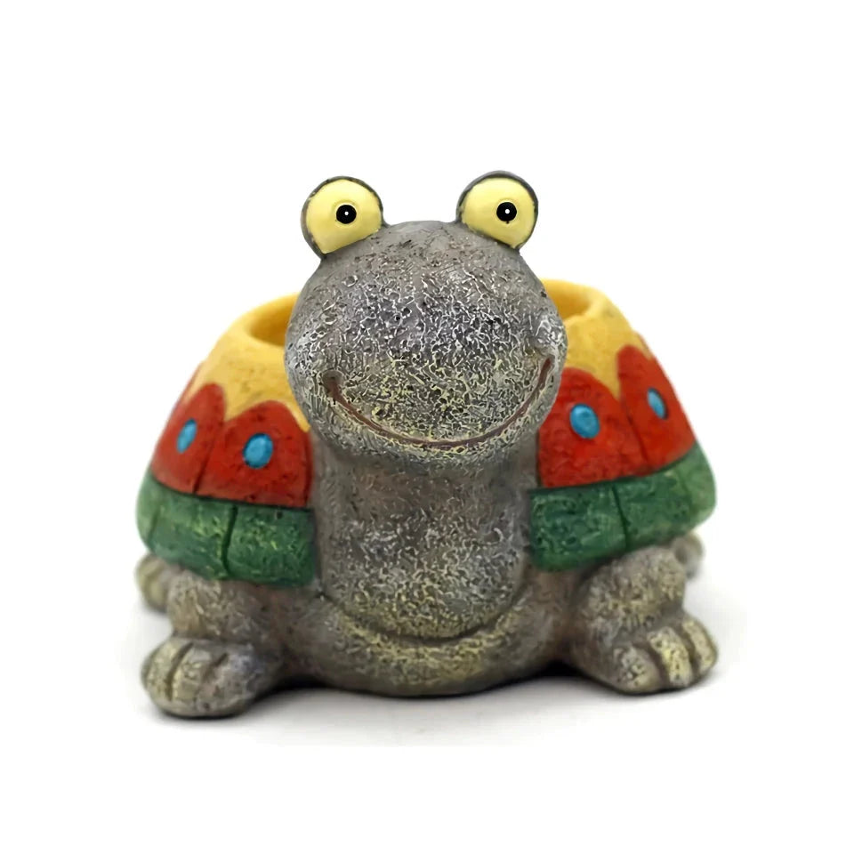 Charming gray cartoon turtle planter holding small potted succulents and cacti
