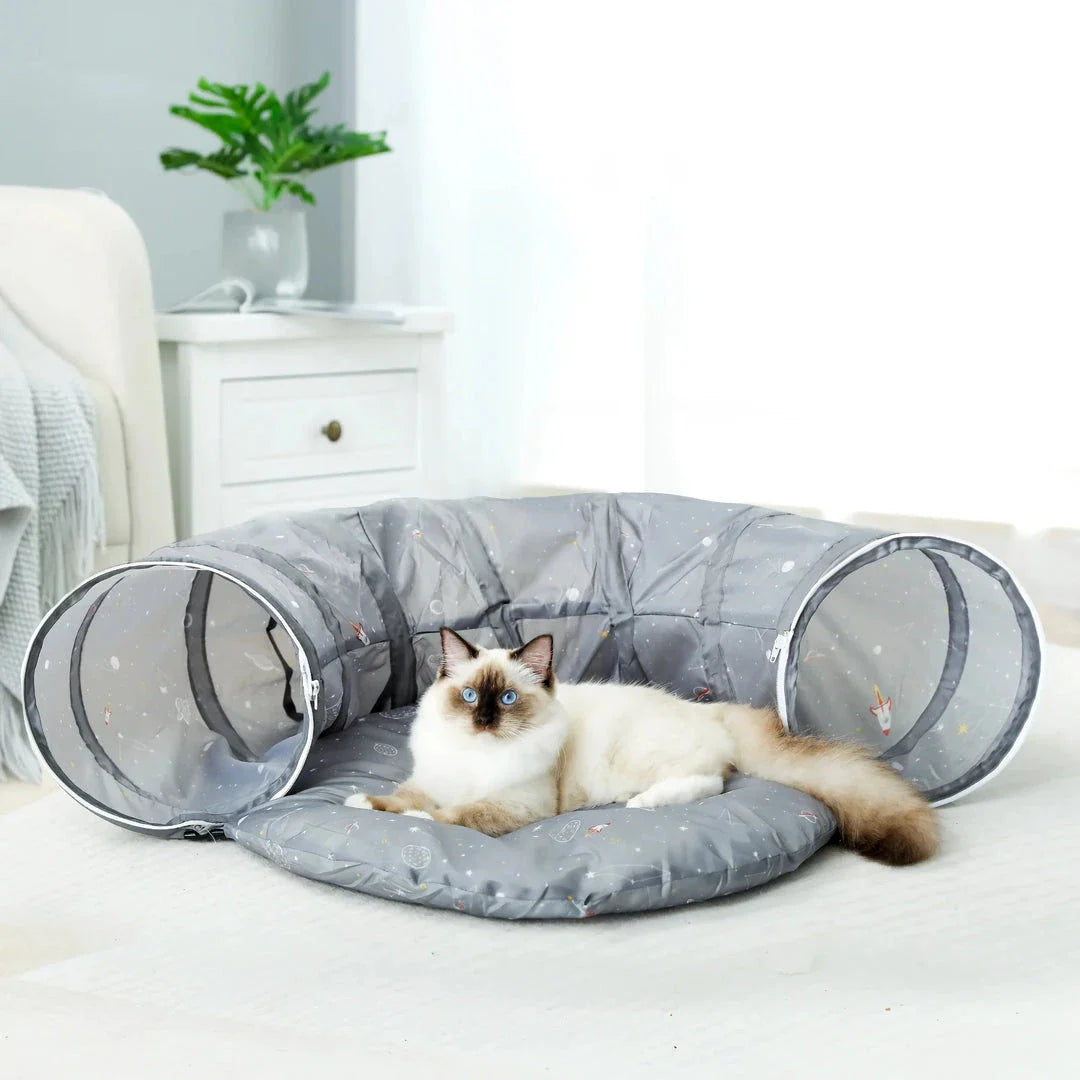 Cozy gray cat tunnel toy with plush mat, offering a fun and relaxing hideaway for cats and small dogs