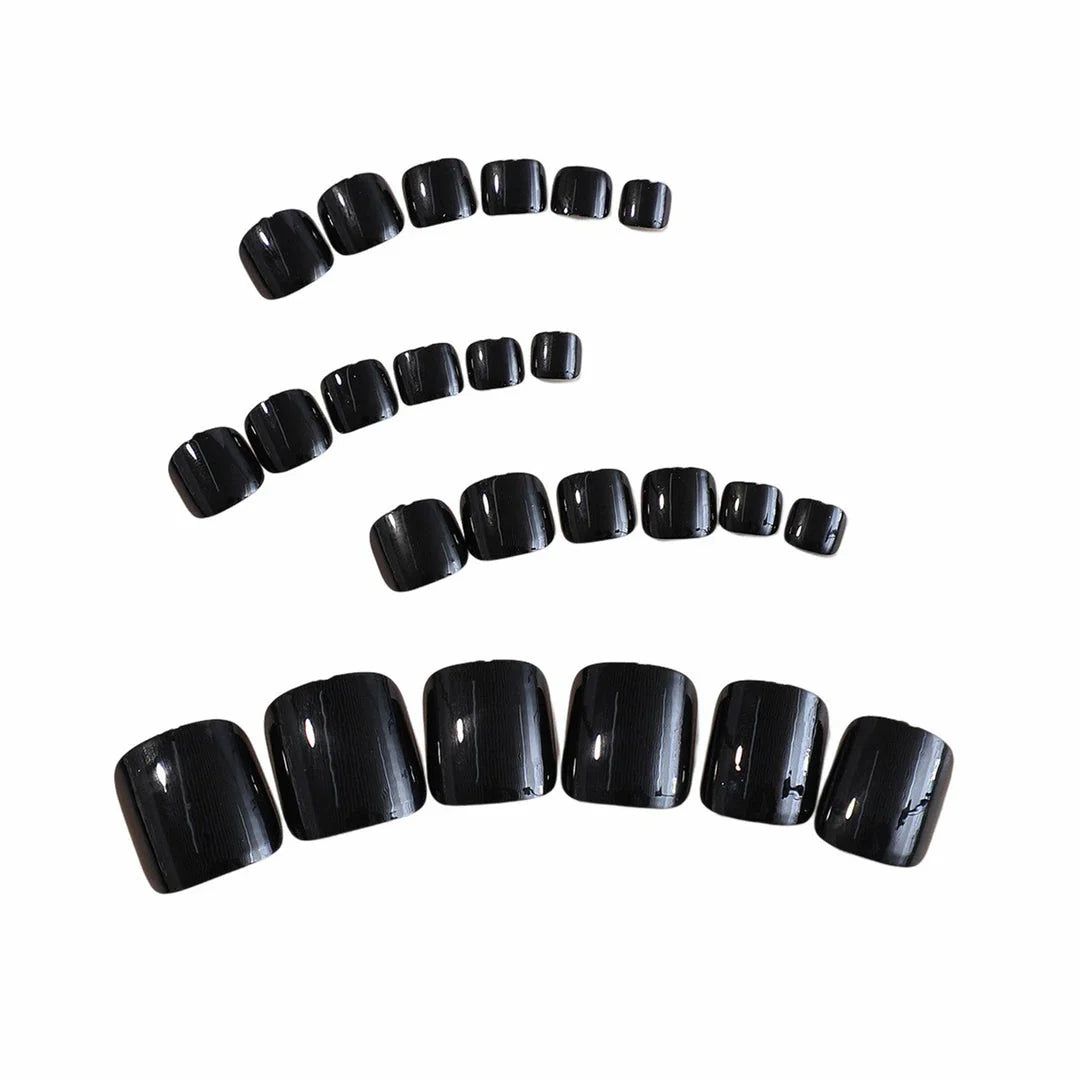 24-piece set of black glossy false toenails for a salon-quality pedicure at home