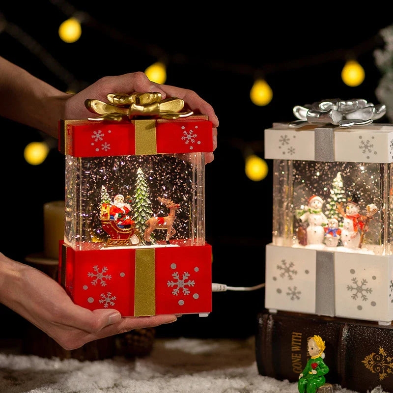 A festive red gift box with a crystal ball night lamp that emits warm, soothing lighting and plays classic Christmas songs.
