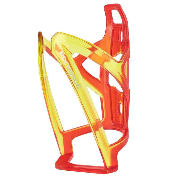 A stylish, lightweight cycling bottle holder with a two-tone design, securely holding a water bottle on a bike.