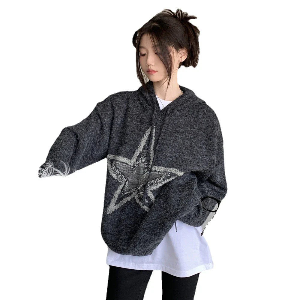 A cozy, vintage-inspired sweater with a five-pointed star design, made in America with premium polyester for lasting comfort and style.