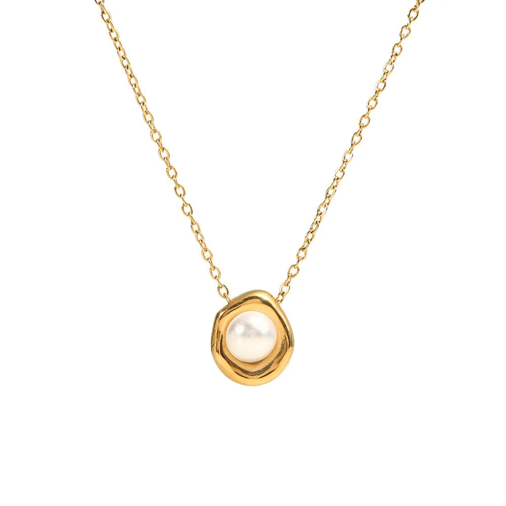 Elegant stainless steel pearl pendant necklace with a geometric design, perfect for women's fashion and everyday style.