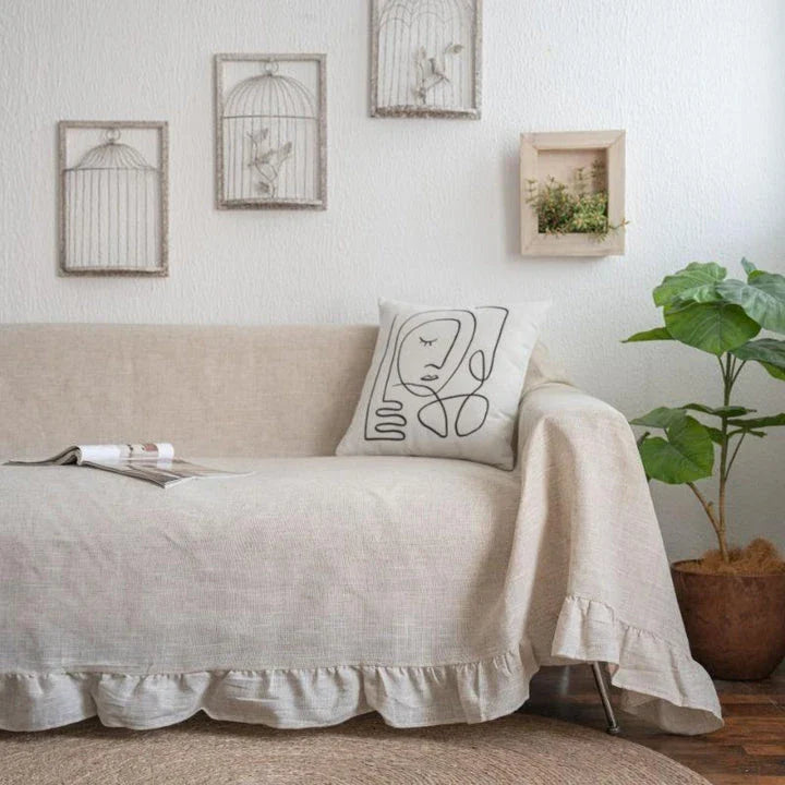 Elegant Ruffled Sofa Cover in Ivory, featuring a sophisticated retro-inspired design that enhances any living room decor