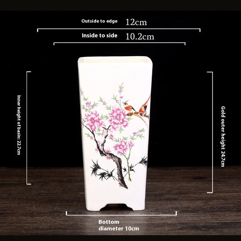 Elegant square ceramic planter in white with a Chinese-inspired design, suitable for indoor plants like asparagus fern and orchid.