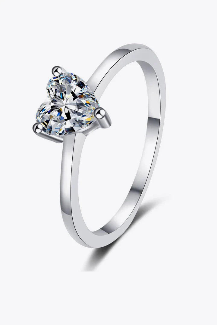 Elegant heart-shaped moissanite solitaire ring in 925 sterling silver with a sleek, modern design