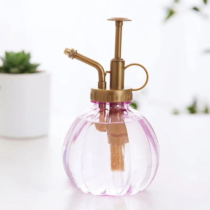 Elegant vintage garden spray bottle with a durable, clear construction and a ring finger bracket for comfortable use