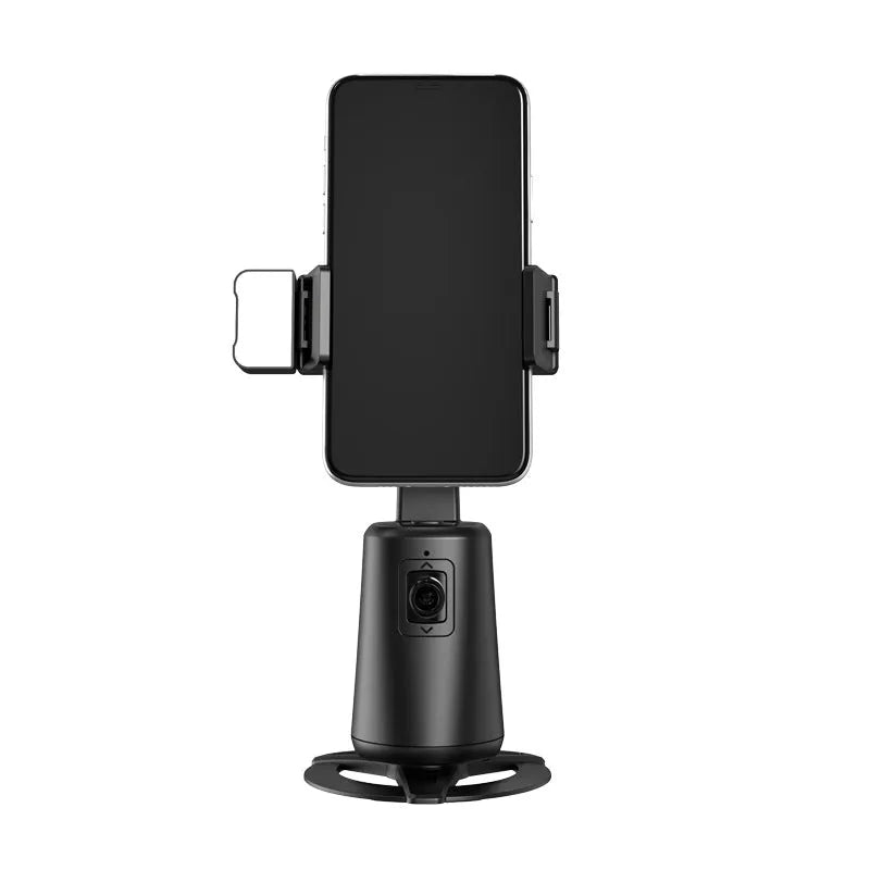 Black desktop phone holder with intelligent face tracking, rotating camera head, and ribbon LED lighting