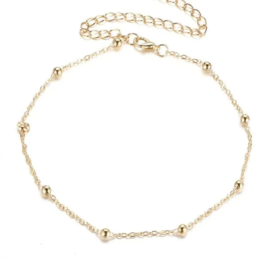 Women's adjustable Bohemian anklet with geometric pendant on twisted chain in gold or silver finish