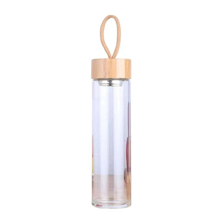Elegant glass water bottle with bamboo lid and string, a sustainable and fashionable hydration solution
