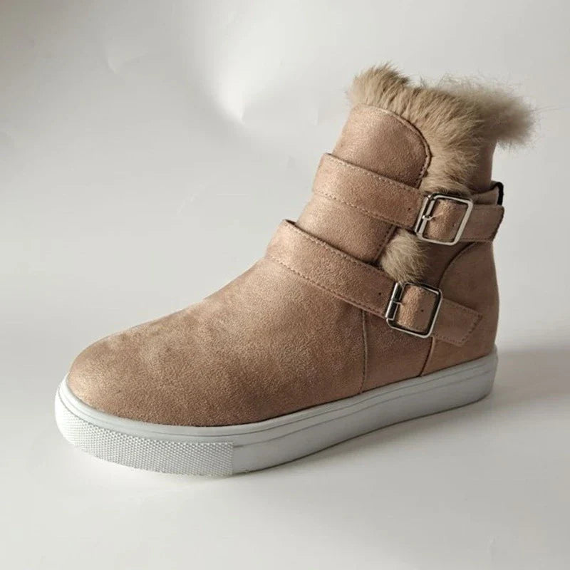 Flat short boots for women in various colors, featuring a suede upper, rubber sole, and wedge heel design