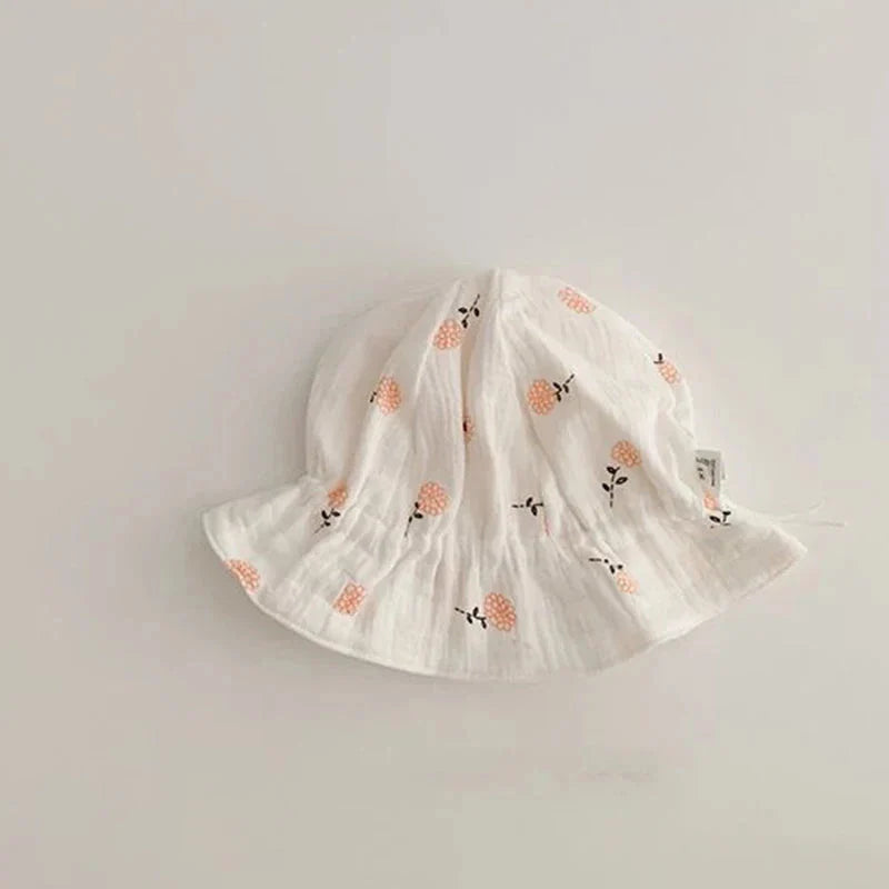 Comfortable and stylish Korean baby bucket hat with adjustable strap and sun protection