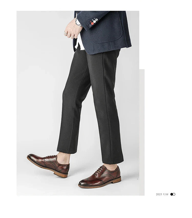 Men's low-top business dress shoes in a polished British retro style, crafted from high-quality cowhide for lasting comfort and sophistication.