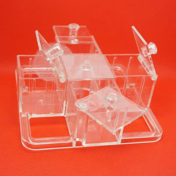 Trendha Foraging Carousel for Parrots - A durable polycarbonate carousel with multiple compartments to challenge your parrot's problem-solving skills and natural foraging instincts.