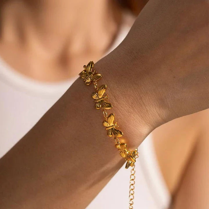 18K gold plated stainless steel bracelet with delicate butterfly pattern and fine polishing