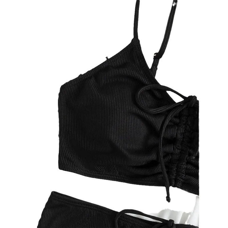Black women's bikini with high waist and sling split design, shown as a two-piece set.