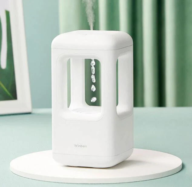 Quiet cool mist humidifier with anti-gravity water droplets, ideal for bedrooms and home decor