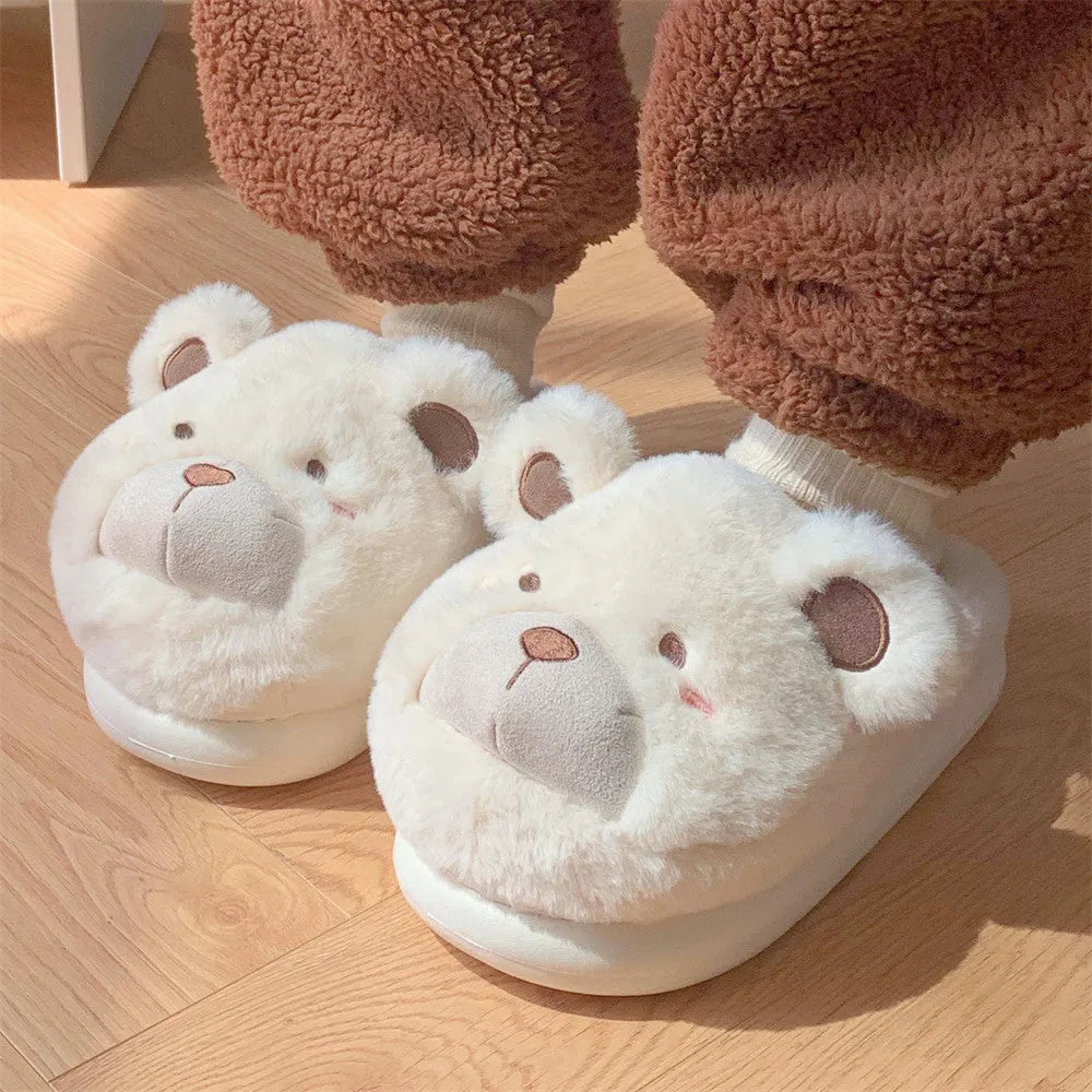 Women's plush suede slippers in cartoon design showing round toe and available colour options