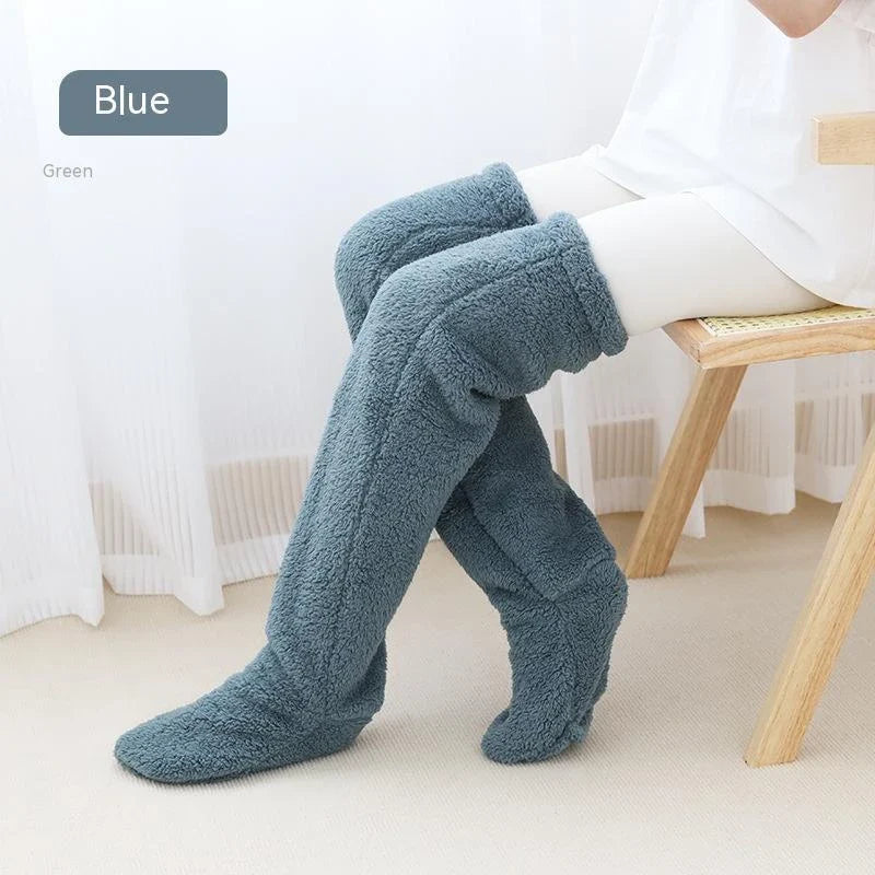 Cozy over-the-knee fuzzy socks in various colors, including brown, blue, dark gray, pink, silver, and more. Comfortable cotton design for warm, snug legs.