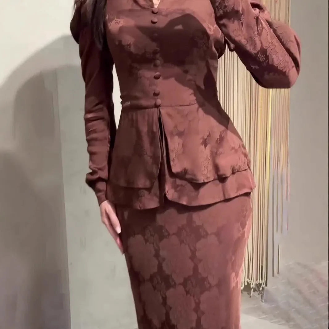 Dark brown retro women's long sleeve dress with floral pattern and button front.