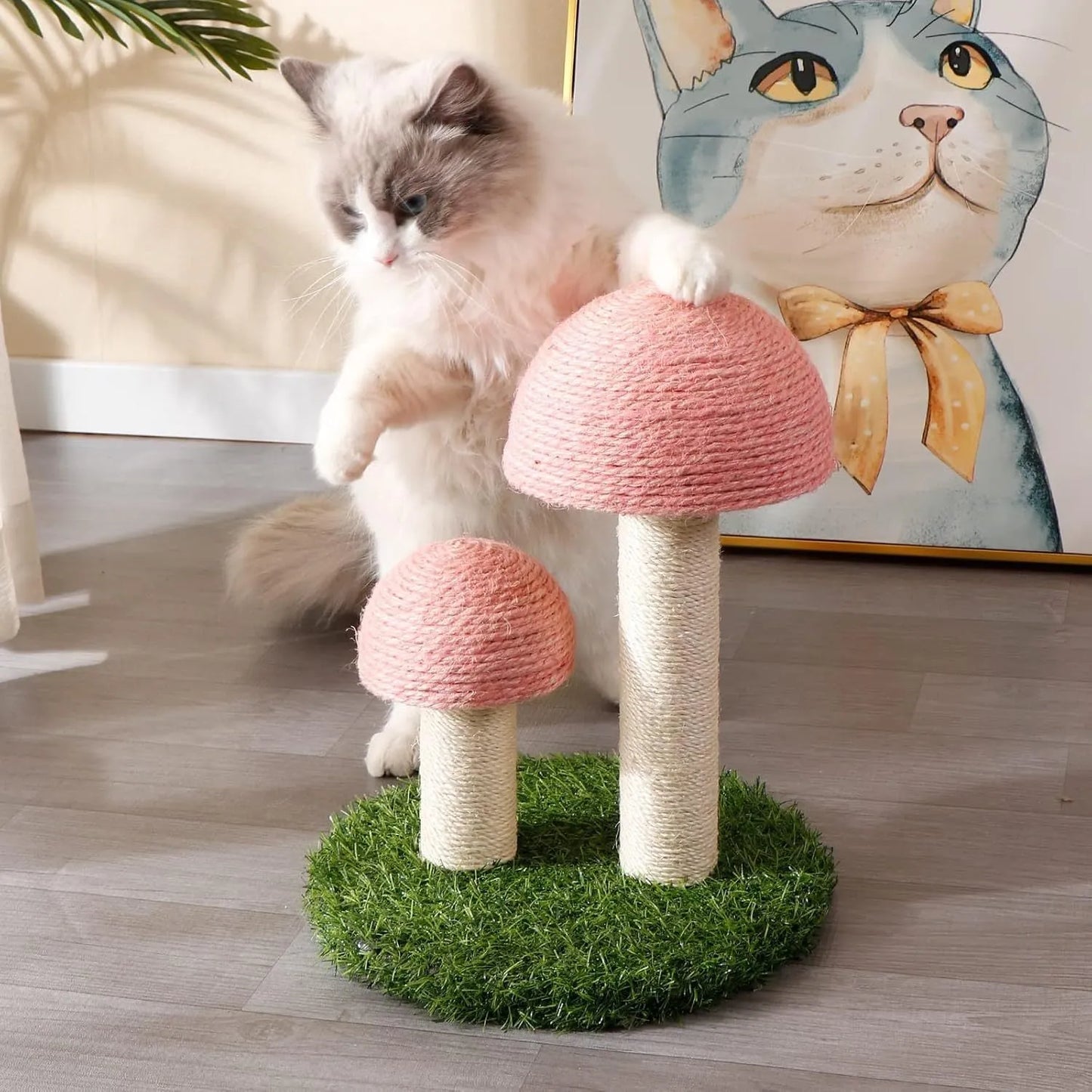 Pink mushroom-shaped cat scratching post with natural sisal texture for small cats.