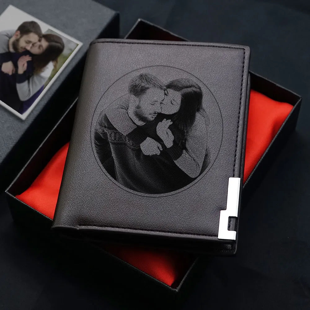 Men's brown leather wallet with a zip closure, presented in individual packaging.