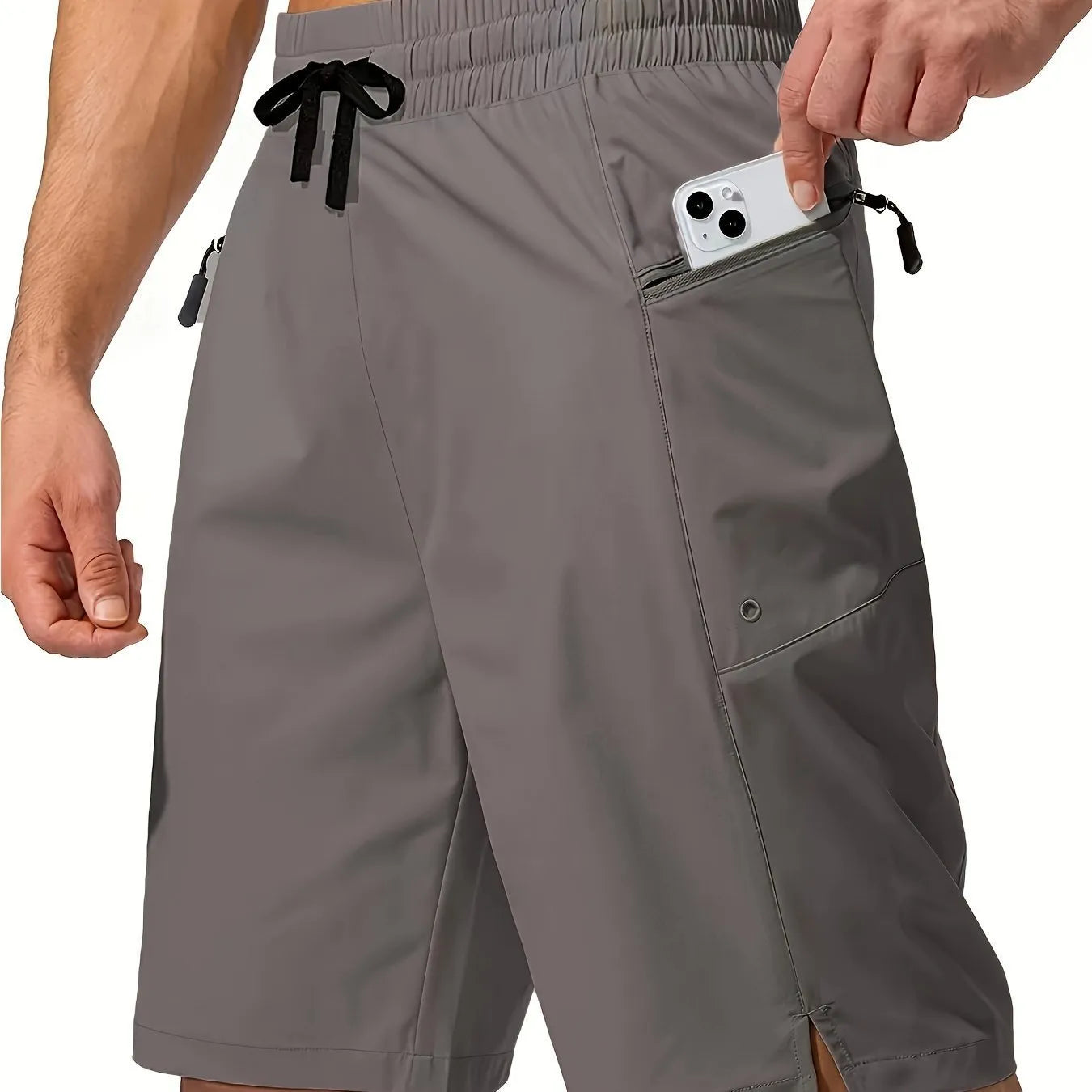 Men's solid-colour quick-drying beach shorts in a straight-leg style on a neutral background.