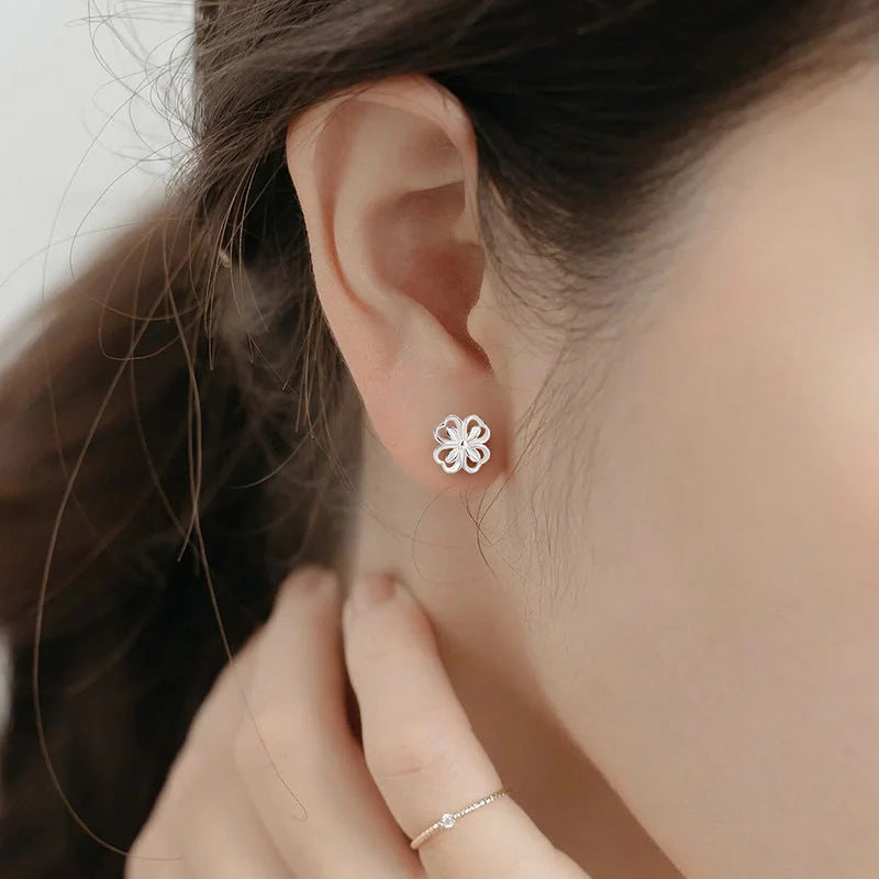 Elegant floral sterling silver stud earrings with screw-back closure for all-day wear