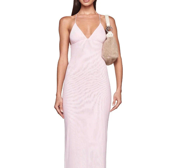 Chic floral halter dress with butterfly-inspired back, available in various vibrant colors and sizes