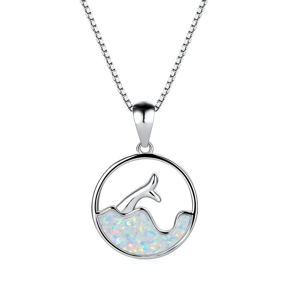 White gold electroplated copper necklace with round blue opal in geometric sea fishtail design on 45cm chain