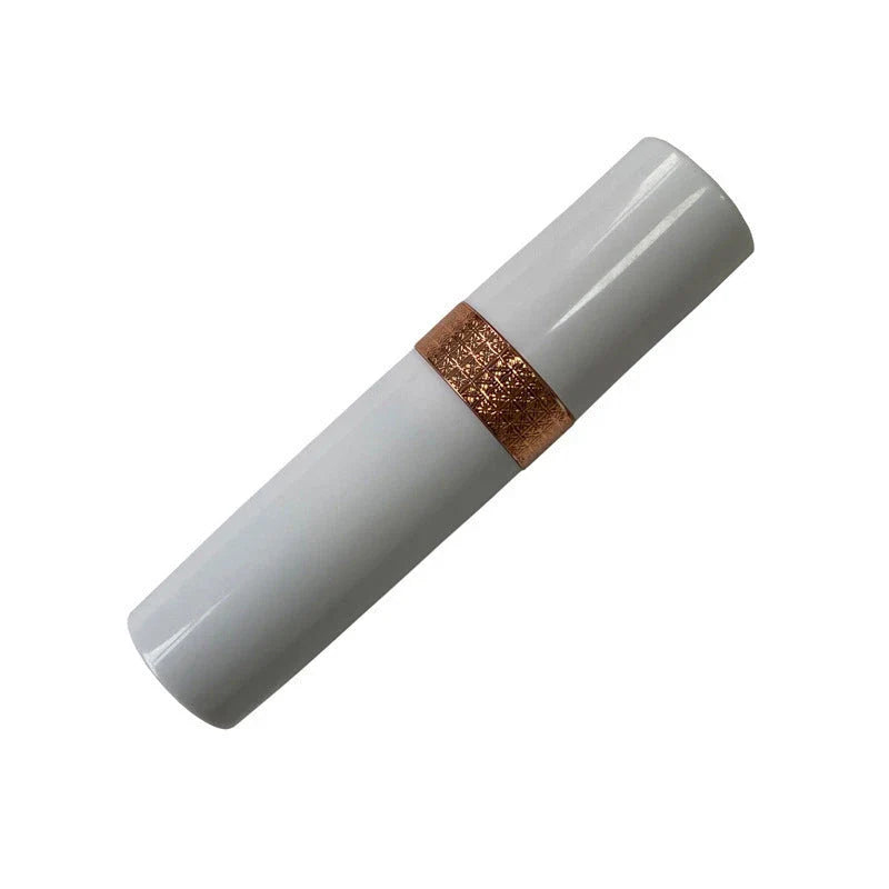 Lipstick-shaped rechargeable hair trimmer with floating 3D head for painless grooming of sensitive areas